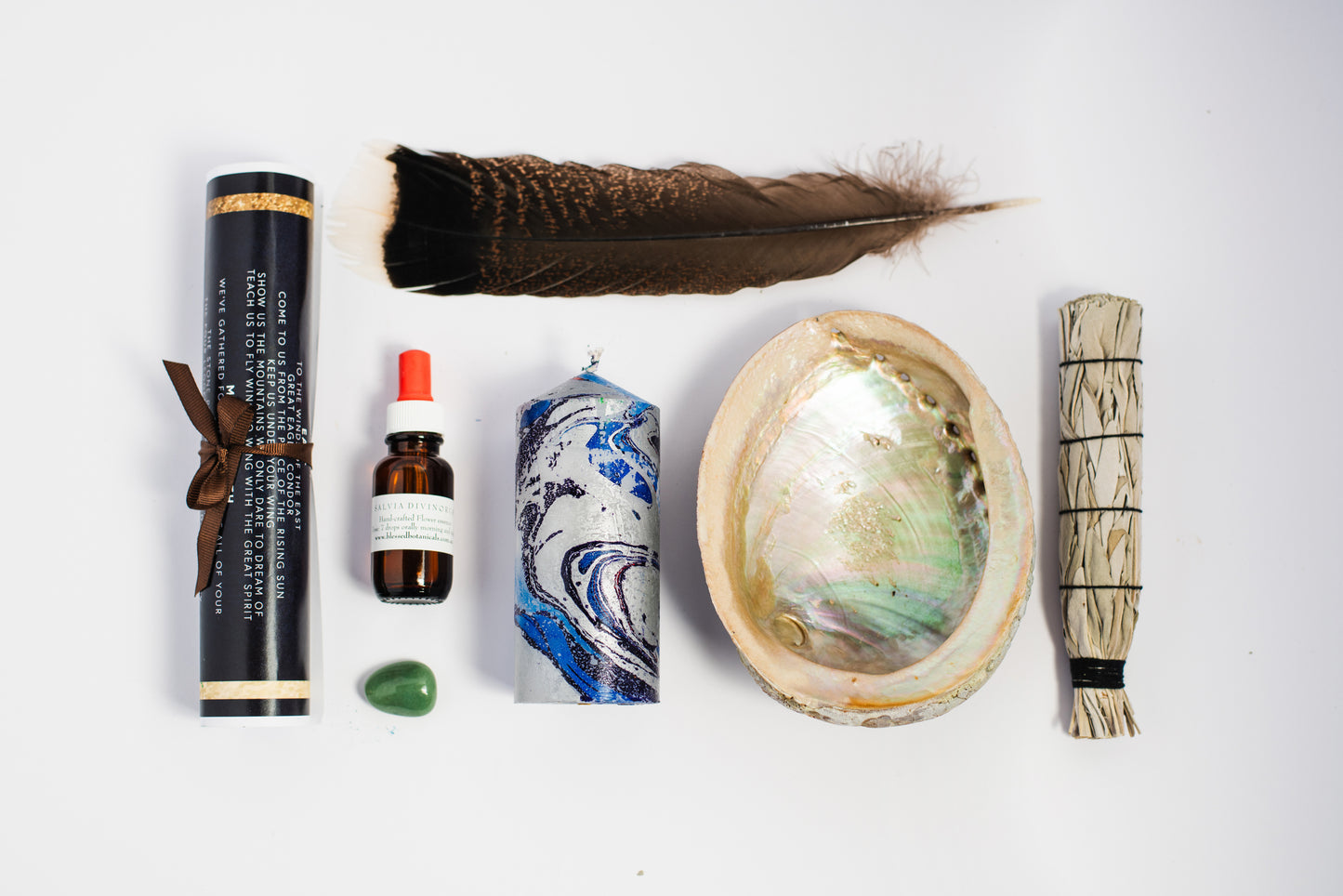 fiona gray herbalist, blessed botanicals apothecary, ritual bundles ceremony sacred, wicca wiccan, pagan, green witch, smudging feather smudge stick invocation setting intentions letting go cleansing purifying nimbin candle factory crystal, new beginnings, green aventurine, abalone shell